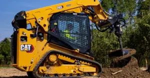 A Cat 265 compact track loader at work