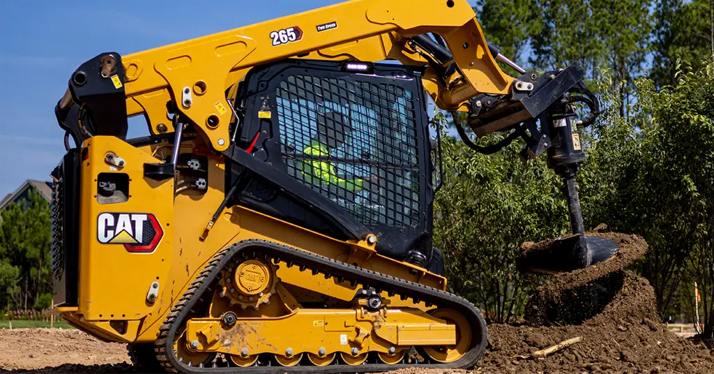 A Cat 265 compact track loader at work