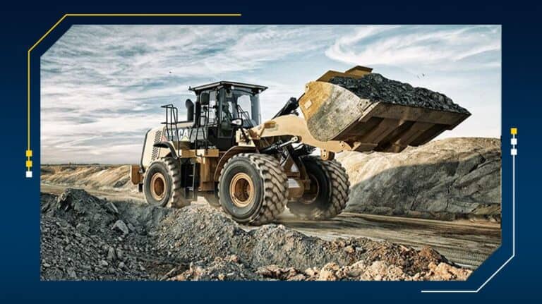 Heavy machinery moving large rocks