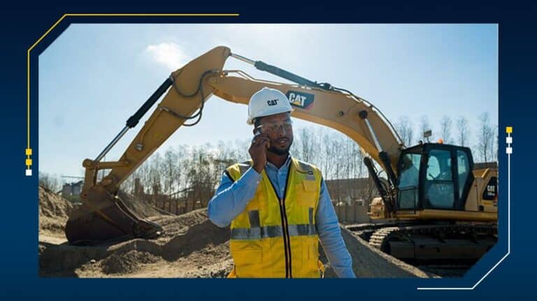 Construction worker talking on phone